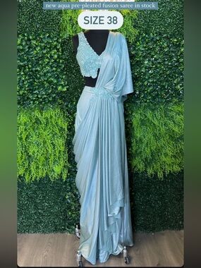 Elegant Light Aqua One-Shoulder Pre-Pleated Saree with Embellished Blouse